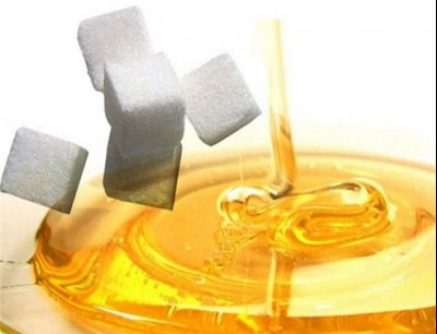 الفرق بين السكر والعسل
